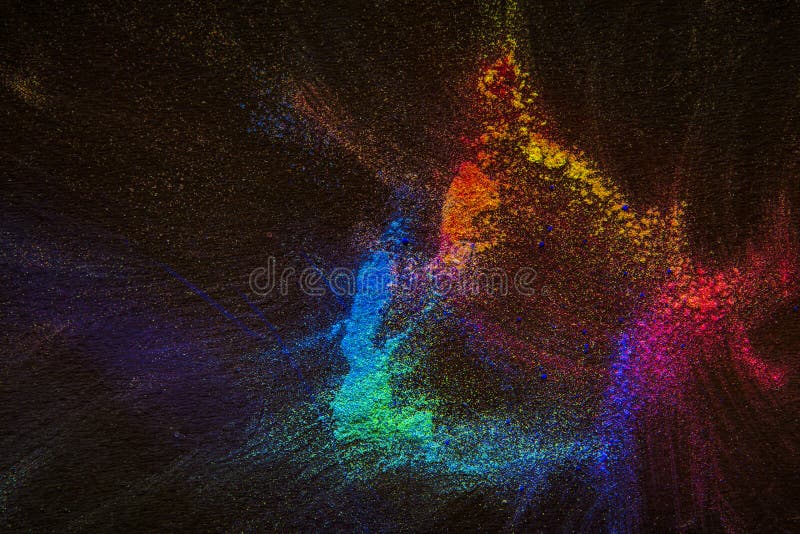 Rainbow burst of dry paint at Holi. Rainbow burst of dry paint at celebration Holi, free space stock photo